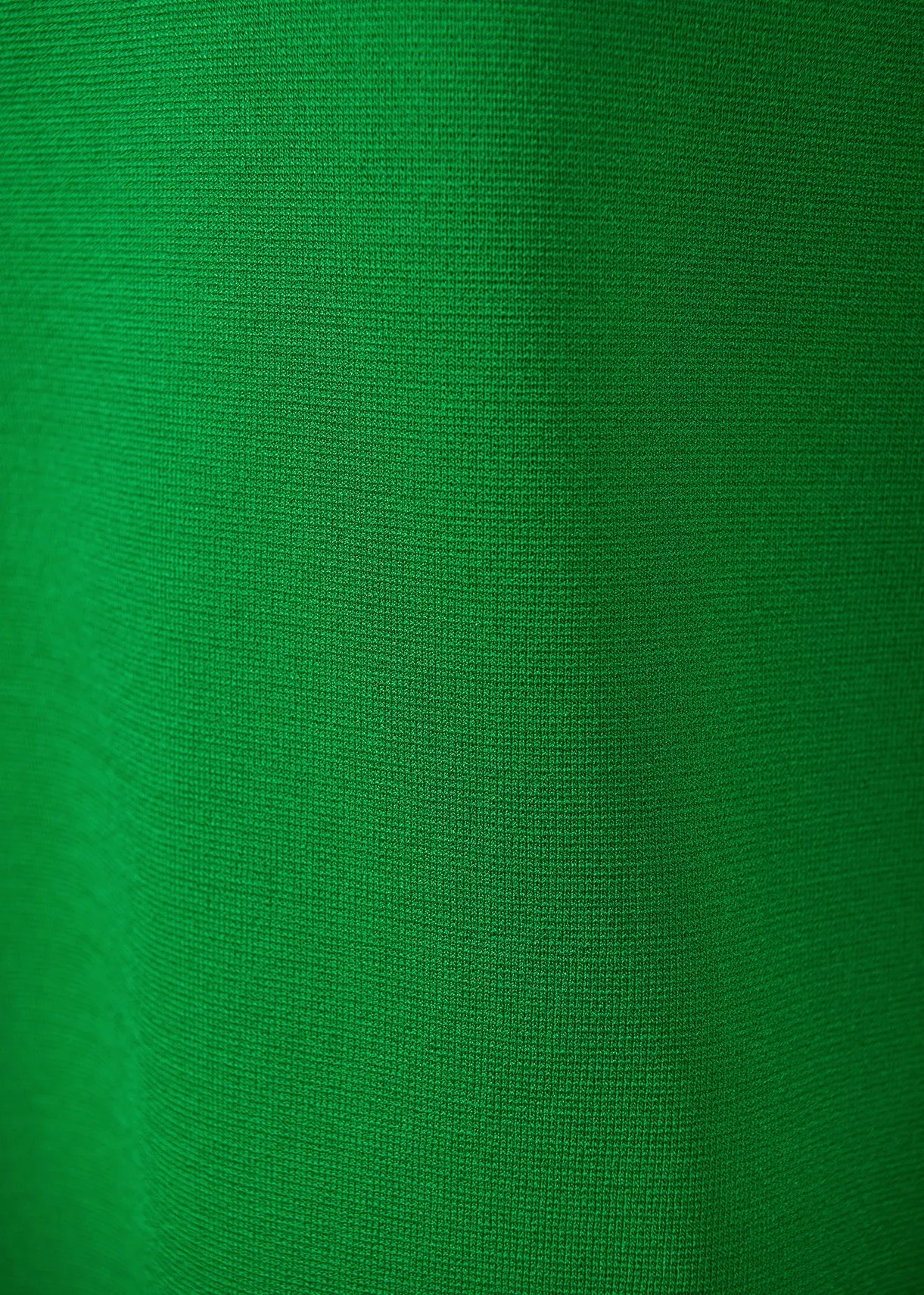 Green sleeveless knitted sweater