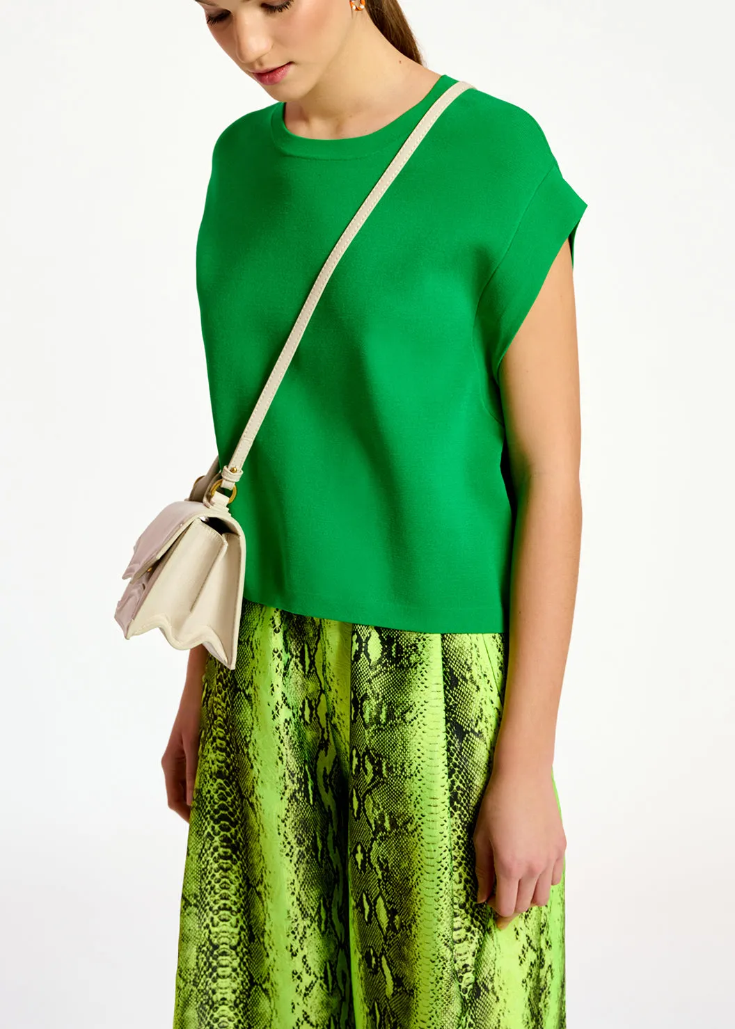 Green sleeveless knitted sweater
