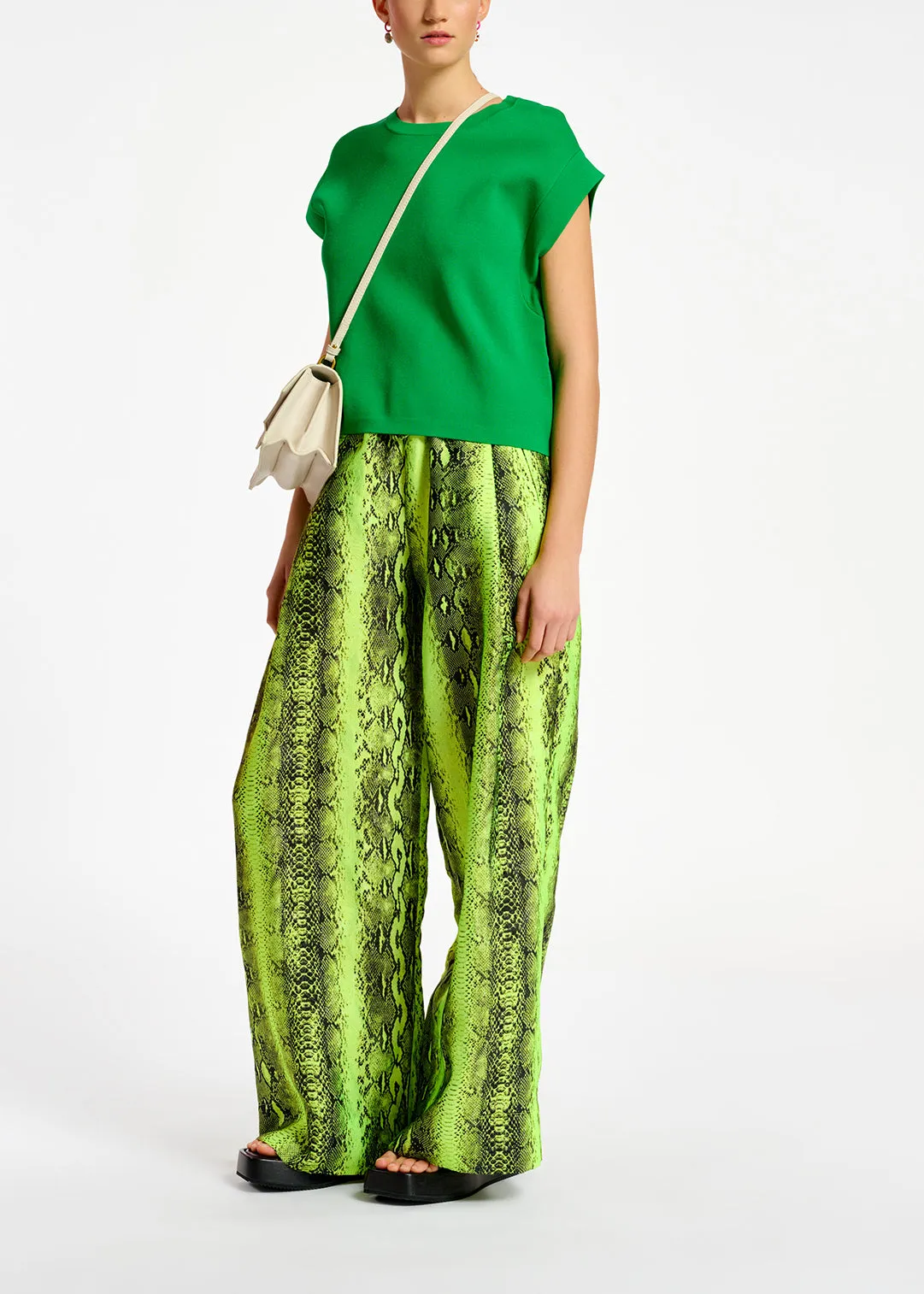 Green sleeveless knitted sweater